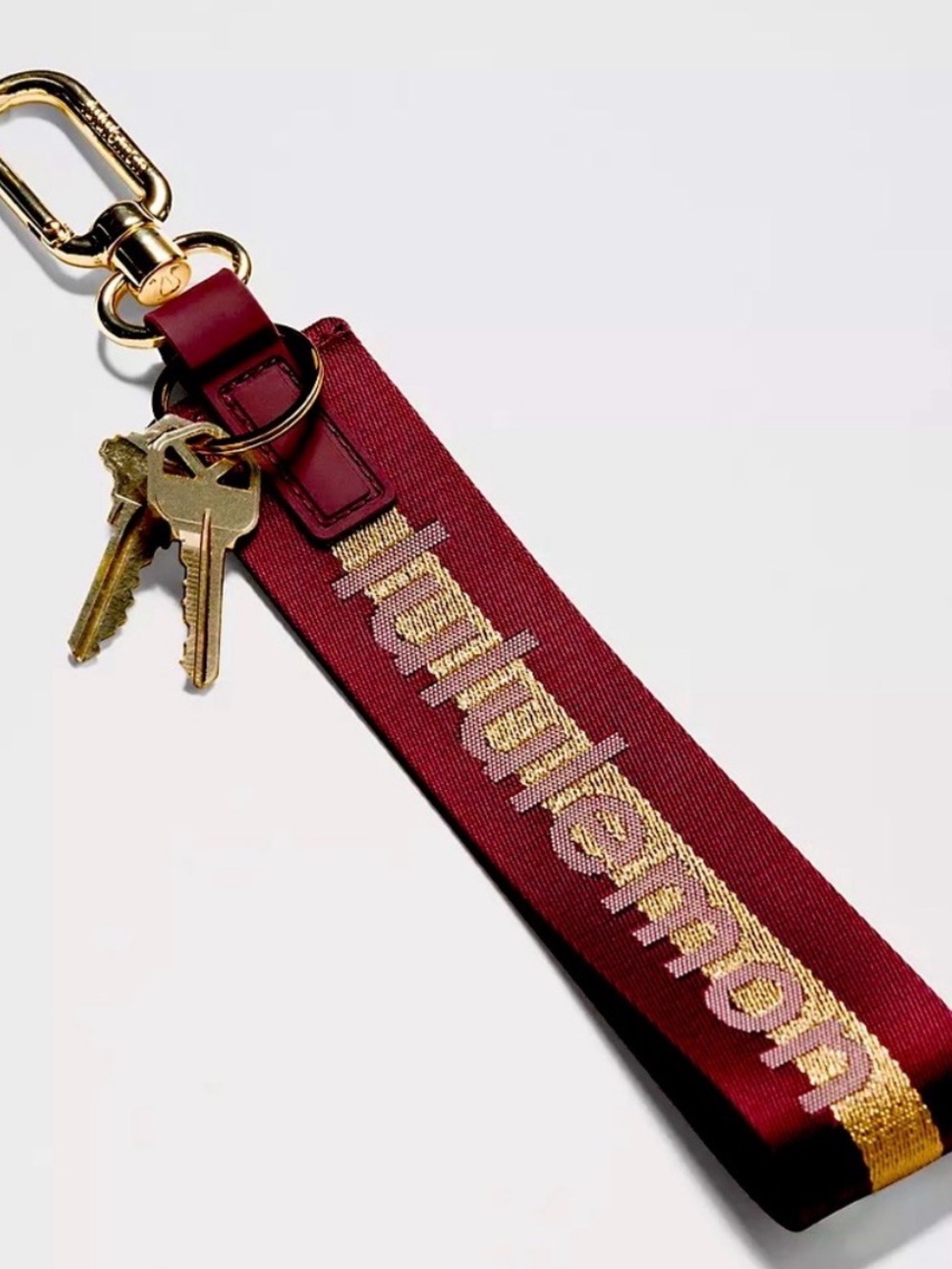 lululemon athletica Burgundy and Gold Logo Keyring Wristlet